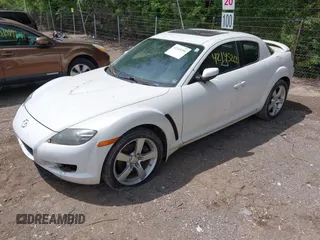 2005 Mazda RX-8 with VIN JM1FE17N150142559, listed as a IAAI auction lot 42145200 with 124,364 mi miles. Bid and sale history available at carsss.com. Image 2.