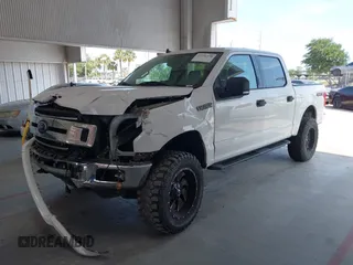 2019 Ford F-150 XL with VIN 1FTEW1E55KFB69767, listed as a IAAI auction lot 42326370 with 143,523 mi miles and . Bid and sale history available at DreamBid. Image 2.