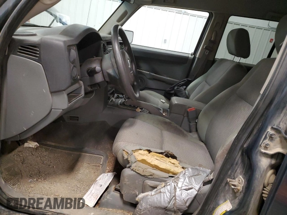 2007 Jeep Commander Sport z VIN 1J8HG48N47C638081, wystawiony jako Copart lot #51793315 z przebiegiem Nie podano mil oraz Szkoda całkowita • Salvage title. Historia ofert i sprzedaży dostępna na DreamBid. Obrazek 7.