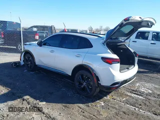 2023 Buick Envision Essence with VIN LRBFZPR40PD195596, listed as a IAAI auction lot 41613206 with 15,597 mi miles. Bid and sale history available at carsss.com. Image 3.