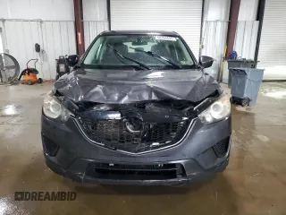 2014 Mazda CX-5 Sport with VIN JM3KE4BEXE0430076, listed as a Copart auction lot 58164695 with 183,130 mi miles and Salvage title. Bid and sale history available at DreamBid. Image 5.
