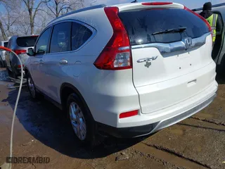 2016 Honda CR-V EX-L with VIN 5J6RM3H73GL011334, listed as a IAAI auction lot 41643636 with 212,792 mi miles. Bid and sale history available at carsss.com. Image 3.