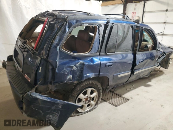 2003 GMC Envoy SLT with VIN 1GKDT13S032165927, listed as a Copart auction lot 68561634 with 0 mi miles and Salvage Title. Bid and sale history available at carsss.com. Image 3.