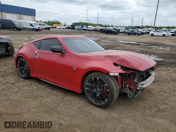 2015 Nissan 370Z z VIN JN1AZ4EH6FM442575, wystawiony jako Copart lot #57146915 z przebiegiem 57 020 mil mil oraz Czysty tytuł • Clean title. Historia ofert i sprzedaży dostępna na DreamBid. Obrazek 4.