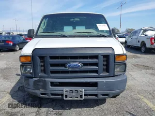 2012 Ford Econoline Cargo Commercial with VIN 1FTNE1EW2CDB17070, listed as a IAAI auction lot 41847884 with 249,165 mi miles and . Bid and sale history available at carsss.com. Image 12.