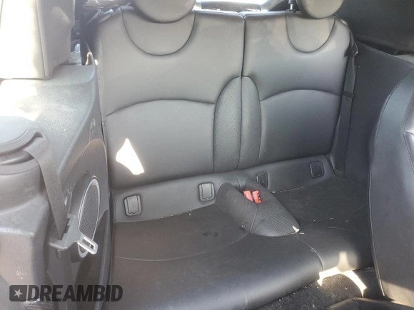 2014 MINI Convertible S с VIN WMWZP3C52ET706661, выставлен на аукционе Copart как лот 70040934 с пробегом 65 484 миль миль и Списание • Salvage title. История ставок и продаж доступна на DreamBid. Изображение 10.