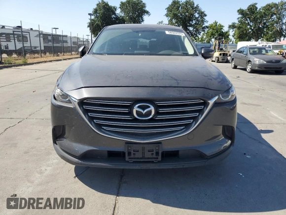 2016 Mazda CX-9 Touring with VIN JM3TCACY1G0108947, listed as a Copart auction lot 58562225 with 86,014 mi miles and Salvage title. Bid and sale history available at DreamBid. Image 5.