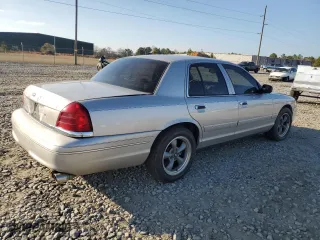 2004 Ford Crown Victoria LX with VIN 2FDFP74W74X150801, listed as a Copart auction lot 43869115 with 138,243 mi miles and Salvage Title. Bid and sale history available at carsss.com. Image 3.