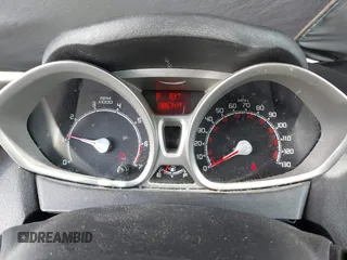 2011 Ford Fiesta SE z VIN 3FADP4BJXBM198683, wystawiony jako IAAI lot #42321736 z przebiegiem 138 674 mil mil oraz . Historia ofert i sprzedaży dostępna na DreamBid. Obrazek 7.