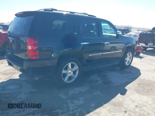 2013 Chevrolet Tahoe LTZ with VIN 1GNSKCE0XDR350970, listed as a IAAI auction lot 41704253 with 126,653 mi miles and . Bid and sale history available at DreamBid. Image 4.