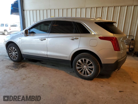 2017 Cadillac XT5 Luxury FWD with VIN 1GYKNBRS0HZ256473, listed as a Copart auction lot 45385105 with 107,314 mi miles and Salvage Title. Bid and sale history available at DreamBid. Image 2.