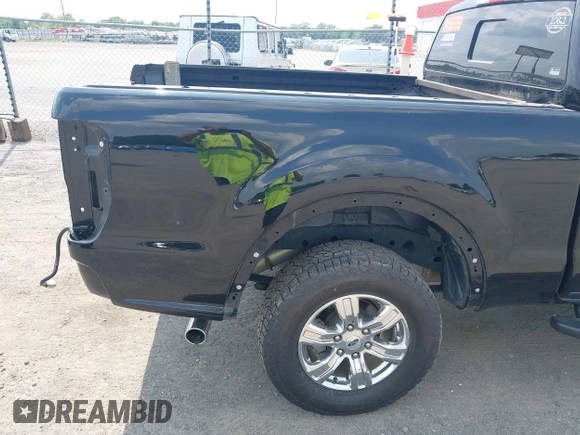 2019 Ford Ranger XL z VIN 1FTER1EHXKLA36781, wystawiony jako IAAI lot #42349085 z przebiegiem 39 311 mil mil oraz . Historia ofert i sprzedaży dostępna na DreamBid. Obrazek 19.