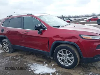 2014 Jeep Cherokee Latitude with VIN 1C4PJMCS2EW175306, listed as a IAAI auction lot 41620115 with 156,578 mi miles and . Bid and sale history available at carsss.com. Image 6.