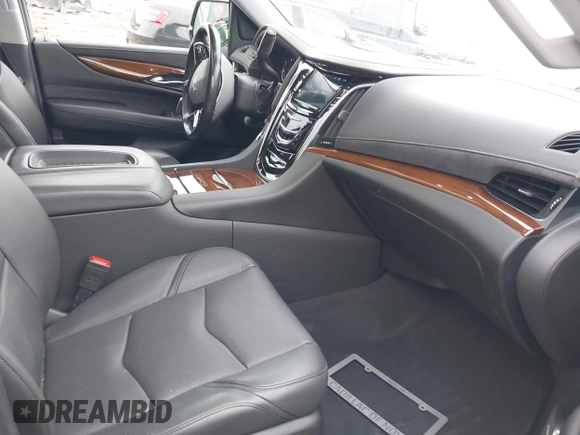 2019 Cadillac Escalade Luxury z VIN 1GYS4BKJ1KR398505, wystawiony jako IAAI lot #40662422 z przebiegiem 57 932 mil mil oraz . Historia ofert i sprzedaży dostępna na DreamBid. Obrazek 5.