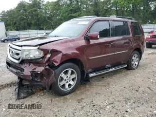 2011 Honda Pilot Touring z VIN 5FNYF3H97BB026475, wystawiony jako Copart lot #58757765 z przebiegiem 138 699 mil mil oraz Szkoda całkowita • Salvage title. Historia ofert i sprzedaży dostępna na DreamBid. Obrazek 1.