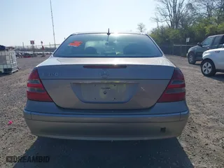 2003 Mercedes-Benz E-Class 3.2L with VIN WDBUF65J93X099223, listed as a IAAI auction lot 42033473 with 230,758 mi miles. Bid and sale history available at carsss.com. Image 16.
