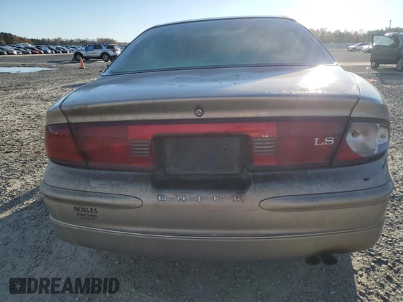 2000 Buick Regal LS with VIN 2G4WB55KXY1112635, listed as a Copart auction lot 82085414 with 0 mi miles and Salvage Title. Bid and sale history available at carsss.com. Image 6.