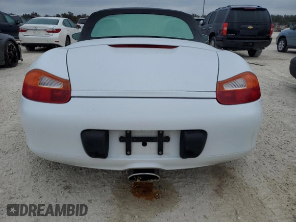 1998 Porsche Boxster с VIN WP0CA2987WU623387, выставлен на аукционе Copart как лот 76859594 с пробегом Не указан миль и Списание • Salvage title. История ставок и продаж доступна на DreamBid. Изображение 6.