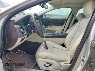 2013 Jaguar XJ Portfolio with VIN SAJWJ2GD5D8V49505, listed as a Copart auction lot 61171955 with 129,158 mi miles and Salvage title. Bid and sale history available at DreamBid. Image 7.