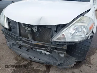 2009 Nissan Versa 1.8 S with VIN 3N1BC13E19L371006, listed as a IAAI auction lot 42064633 with 67,424 mi miles. Bid and sale history available at carsss.com. Image 6.