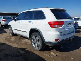 2013 Jeep Grand Cherokee Overland with VIN 1C4RJECT4DC526160, listed as a IAAI auction lot 41429164 with 115,311 mi miles. Bid and sale history available at carsss.com. Image 3.