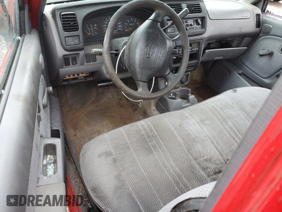 2000 Nissan Frontier XE z VIN 1N6DD21S8YC338304, wystawiony jako Copart lot #83990454 z przebiegiem 184 467 mil mil oraz Szkoda całkowita • Salvage title. Historia ofert i sprzedaży dostępna na DreamBid. Obrazek 8.