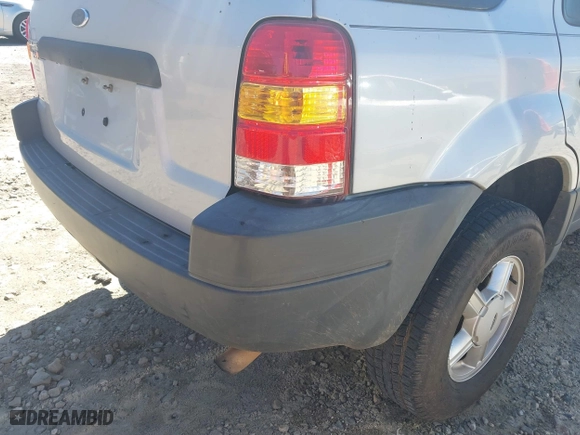 2003 Ford Escape XLT Popular with VIN 1FMYU03103KC87839, listed as a IAAI auction lot 41831997 with 241,204 mi miles. Bid and sale history available at carsss.com. Image 13.