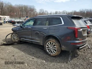 2022 Cadillac XT6 Premium Luxury with VIN 1GYKPDRS9NZ120814, listed as a Copart auction lot 51143485 with 70,977 mi miles and Salvage Title. Bid and sale history available at carsss.com. Image 2.