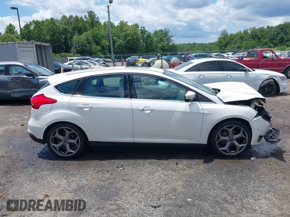 2016 Ford Focus Titanium with VIN 1FADP3N21GL309340, listed as a IAAI auction lot 42518653 with 101,555 mi miles and . Bid and sale history available at DreamBid. Image 13.