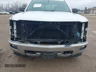 2014 Chevrolet Silverado 1500 LT with VIN 3GCUKREC6EG194197, listed as a IAAI auction lot 41999718 with 206,916 mi miles and . Bid and sale history available at DreamBid. Image 6.