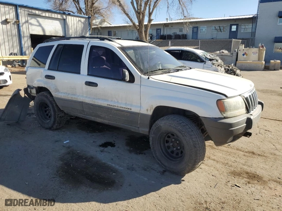 2002 Jeep Grand Cherokee Laredo with VIN 1J4GW48S72C298133, listed as a Copart auction lot 43973315 with 266,437 mi miles and Salvage Title. Bid and sale history available at carsss.com. Image 4.