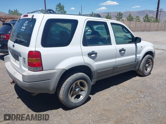 2002 Ford Escape XLS Choice with VIN 1FMYU02132KA46180, listed as a IAAI auction lot 42562178 with 225,404 mi miles and . Bid and sale history available at DreamBid. Image 4.