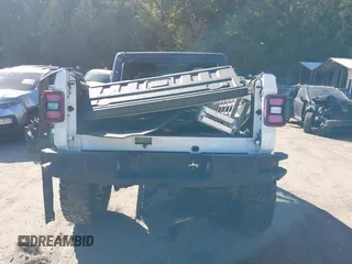 2020 Jeep Gladiator Sport S with VIN 1C6HJTAG3LL109494, listed as a IAAI auction lot 40677949 with 52,079 mi miles and . Bid and sale history available at DreamBid. Image 16.