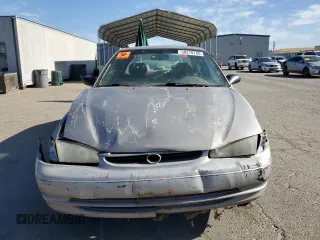 1998 Toyota Corolla VE with VIN 1NXBR12E3WZ093073, listed as a Copart auction lot 58270705 with 303,875 mi miles and Salvage title. Bid and sale history available at DreamBid. Image 5.