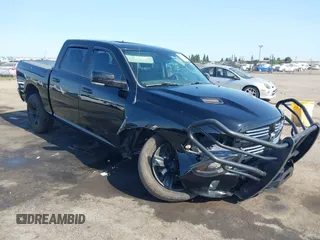 2014 Ram 1500 Sport with VIN 1C6RR7MT5ES270869, listed as a IAAI auction lot 42565947 with 105,858 mi miles and . Bid and sale history available at DreamBid. Image 1.