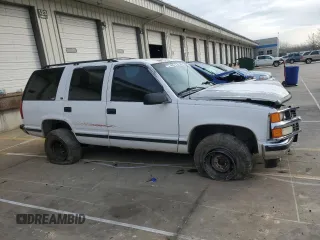 1998 Chevrolet Tahoe z VIN 1GNEK13R7WJ340188, wystawiony jako Copart lot #52177815 z przebiegiem 217 850 mil mil oraz Szkody całkowita. Historia ofert i sprzedaży dostępna na DreamBid. Obrazek 4.