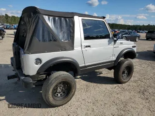 1987 Suzuki Samurai z VIN JS3JC51C3H4186141, wystawiony jako Copart lot #72551804 z przebiegiem 525 030 mil mil oraz Szkody całkowita. Historia ofert i sprzedaży dostępna na DreamBid. Obrazek 3.