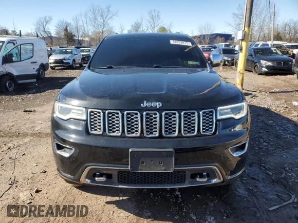 2019 Jeep Grand Cherokee Overland with VIN 1C4RJFCG9KC569575, listed as a Copart auction lot 48952875 with 87,053 mi miles and Salvage Title. Bid and sale history available at carsss.com. Image 5.