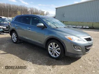 2012 Mazda CX-9 Grand Touring with VIN JM3TB3DV4C0364223, listed as a Copart auction lot 49413805 with 103,257 mi miles and Salvage Title. Bid and sale history available at DreamBid. Image 4.
