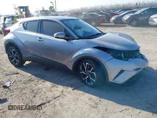 2018 Toyota C-HR XLE with VIN NMTKHMBX3JR013292, listed as a IAAI auction lot 41663390 with 68,654 mi miles. Bid and sale history available at carsss.com. Image 1.