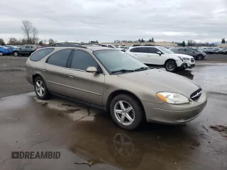 2002 Ford Taurus SE Standard z VIN 1FAFP58232G206714, wystawiony jako Copart lot #45911595 z przebiegiem 150 192 mil mil oraz Szkoda całkowita • Salvage title. Historia ofert i sprzedaży dostępna na DreamBid. Obrazek 4.