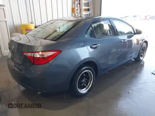 2016 Toyota Corolla L with VIN 5YFBURHE1GP482365, listed as a IAAI auction lot 41902840 with 124,165 mi miles and . Bid and sale history available at DreamBid. Image 4.