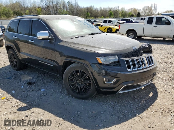 2015 Jeep Grand Cherokee Overland with VIN 1C4RJFCG3FC104439, listed as a Copart auction lot 50780295 with 196,549 mi miles and Salvage Title. Bid and sale history available at carsss.com. Image 4.