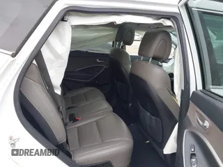 2014 Hyundai Santa Fe z VIN 5XYZUDLB9EG227009, wystawiony jako IAAI lot #42272191 z przebiegiem 97 474 mil mil oraz . Historia ofert i sprzedaży dostępna na DreamBid. Obrazek 8.