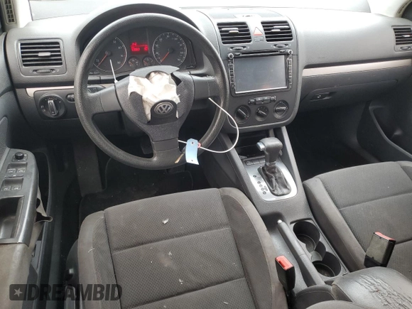 2009 Volkswagen Rabbit S z VIN WVWDB71K49W021674, wystawiony jako Copart lot #56115715 z przebiegiem 159 860 mil mil oraz Szkoda całkowita • Salvage title. Historia ofert i sprzedaży dostępna na DreamBid. Obrazek 8.