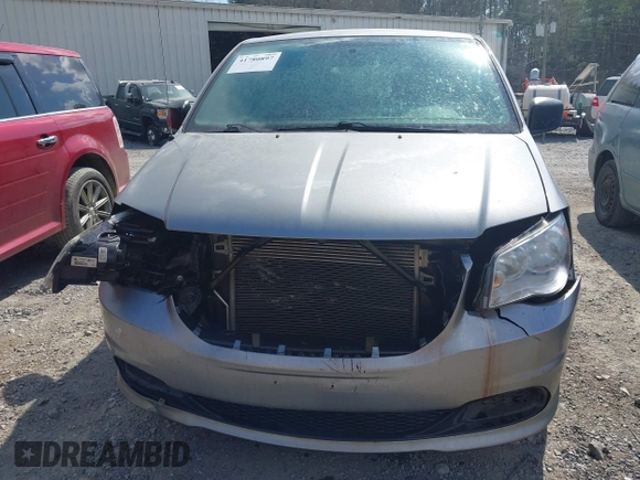 2015 Dodge Grand Caravan American Value with VIN 2C4RDGBG6FR576897, listed as a IAAI auction lot 41780897 with 159,823 mi miles and . Bid and sale history available at DreamBid. Image 12.