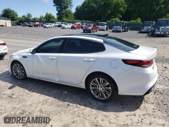 2016 Kia Optima SXL Turbo z VIN 5XXGV4L20GG121446, wystawiony jako Copart lot #57895125 z przebiegiem 131 889 mil mil oraz Czysty tytuł • Clean title. Historia ofert i sprzedaży dostępna na DreamBid. Obrazek 2.