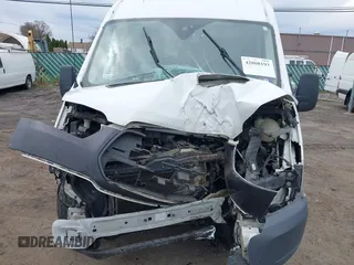 2015 Ford Transit Cargo z VIN 1FTNR2CM4FKA84584, wystawiony jako IAAI lot #42008193 z przebiegiem 224 453 mil mil oraz . Historia ofert i sprzedaży dostępna na DreamBid. Obrazek 10.