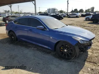 2021 Cadillac CT5 Luxury with VIN 1G6DM5RK3M0134243, listed as a Copart auction lot 58936485 with 48,288 mi miles and Salvage title. Bid and sale history available at DreamBid. Image 4.