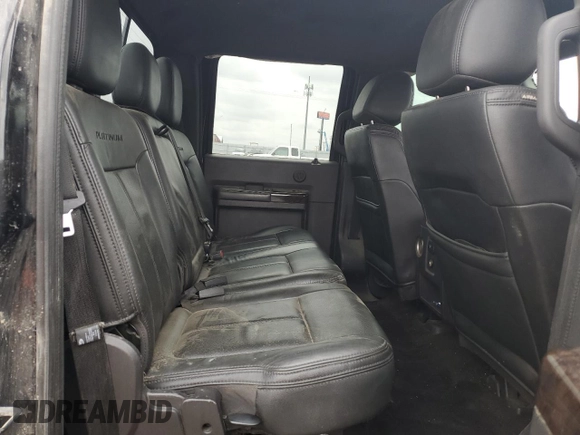 2013 Ford F-350 Platinum z VIN 1FT8W3BTXDEB51852, wystawiony jako Copart lot #58228825 z przebiegiem 6 577 mil mil oraz Szkoda całkowita • Salvage title. Historia ofert i sprzedaży dostępna na DreamBid. Obrazek 10.